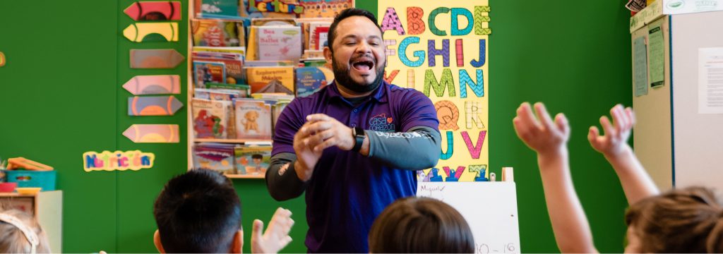 Instructor teaching in a spanish immersion daycare